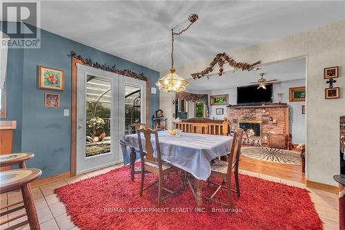 4916 Thirty Road, Lincoln, ON - Indoor Photo Showing Dining Room With Fireplace