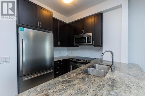 1106 - 7730 Kipling Avenue, Vaughan, ON - Indoor Photo Showing Kitchen With Stainless Steel Kitchen With Double Sink