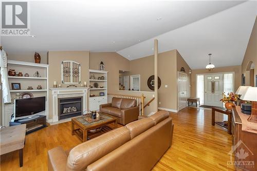 6923 Lakes Park Drive, Greely, ON - Indoor Photo Showing Living Room With Fireplace