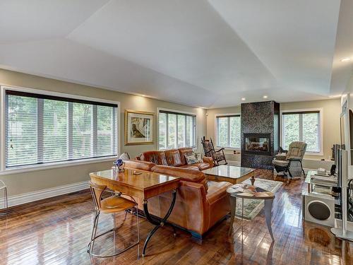 Family room - 87 Av. Henley, Mont-Royal, QC - Indoor Photo Showing Living Room With Fireplace