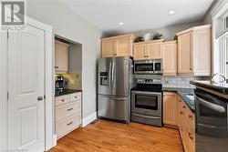 Kitchen- 4 stainless steel appliances and coffee nook - 