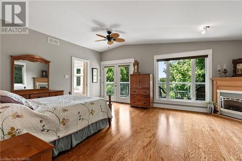 2nd storey - primary bedroom - 58 Victoria Street, Kincardine, ON - Indoor Photo Showing Bedroom With Fireplace