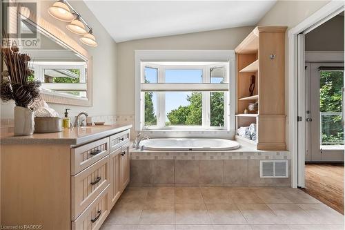 Primary ensuite jacuzzi tub with lake views - 58 Victoria Street, Kincardine, ON - Indoor Photo Showing Bathroom