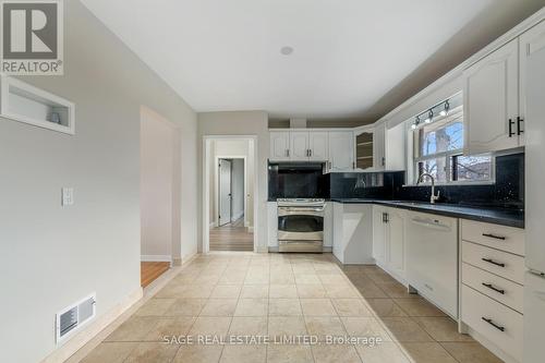 41 Walwyn Avenue, Toronto (Humberlea-Pelmo Park), ON - Indoor Photo Showing Kitchen