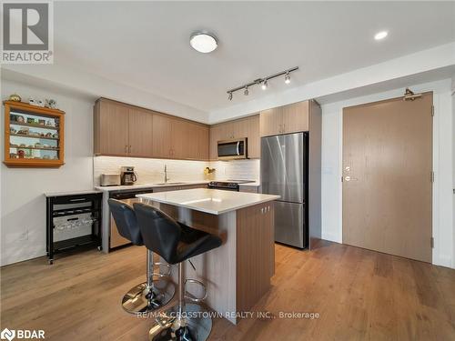 702 - 58 Lakeside Terrace, Barrie (Little Lake), ON - Indoor Photo Showing Kitchen With Upgraded Kitchen