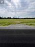 View from the freshly resurfaced road showing culvert and access to the property - N/A Johnson Road, South Glengarry, ON 