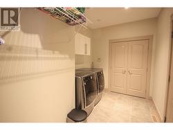 Spacious Laundry mud room with access to the triple car garage - 