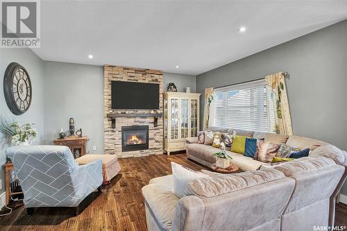 551 Redwood Crescent, Warman, SK - Indoor Photo Showing Living Room With Fireplace