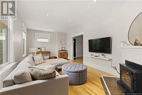 300 Highfield, Moncton, NB - Indoor Photo Showing Living Room With Fireplace