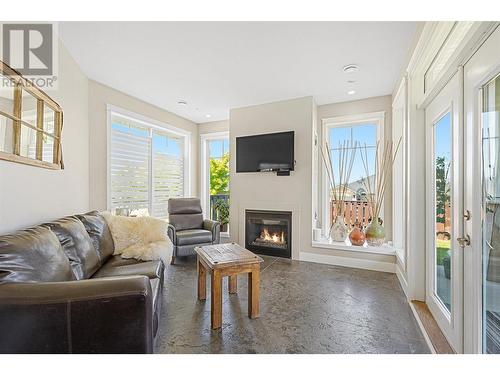 1419 Montenegro Drive, Kelowna, BC - Indoor Photo Showing Living Room With Fireplace