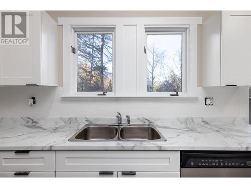 7884 Alpine Road, Kelowna, BC - Indoor Photo Showing Kitchen With Double Sink