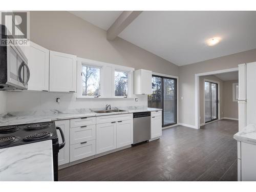 7884 Alpine Road, Kelowna, BC - Indoor Photo Showing Kitchen With Double Sink