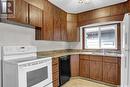 1402 Dover Avenue, Regina, SK  - Indoor Photo Showing Kitchen With Double Sink 