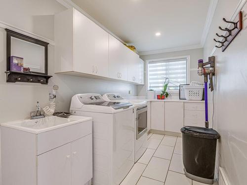 Salle de lavage - 1207 Rue Jean-Vincent, Carignan, QC - Indoor Photo Showing Laundry Room