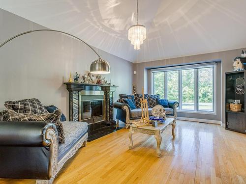 Salon - 1207 Rue Jean-Vincent, Carignan, QC - Indoor Photo Showing Living Room With Fireplace