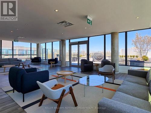 417 - 150 Logan Avenue, Toronto (South Riverdale), ON - Indoor Photo Showing Living Room