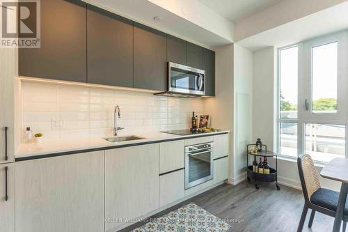 417 - 150 Logan Avenue, Toronto (South Riverdale), ON - Indoor Photo Showing Kitchen With Upgraded Kitchen