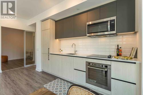 417 - 150 Logan Avenue, Toronto (South Riverdale), ON - Indoor Photo Showing Kitchen