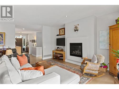 302 Upper Canyon Drive, Kelowna, BC - Indoor Photo Showing Living Room With Fireplace