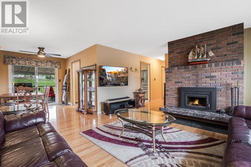 2109 Hadden Court, Kelowna, BC - Indoor Photo Showing Living Room With Fireplace