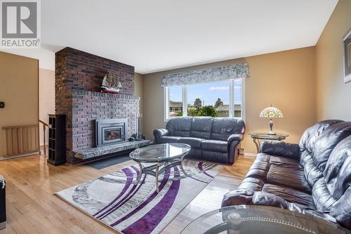 2109 Hadden Court, Kelowna, BC - Indoor Photo Showing Living Room With Fireplace