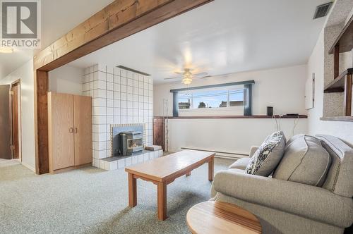 2109 Hadden Court, Kelowna, BC - Indoor Photo Showing Living Room With Fireplace