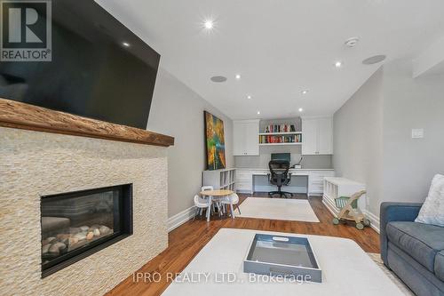 8 Sir Raymond Drive, Toronto (Guildwood), ON - Indoor Photo Showing Living Room With Fireplace