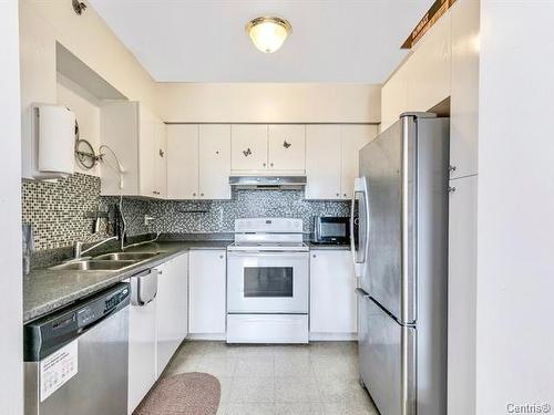 Cuisine - 406-6840 Av. Fielding, Montréal (Côte-Des-Neiges/Notre-Dame-De-Grâce), QC - Indoor Photo Showing Kitchen With Double Sink