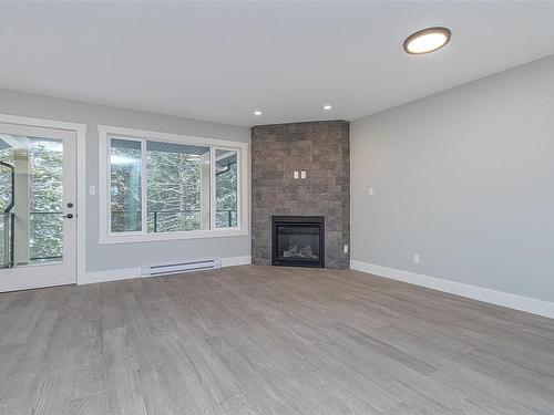 4021 Otters Close, Duncan, BC - Indoor Photo Showing Living Room With Fireplace