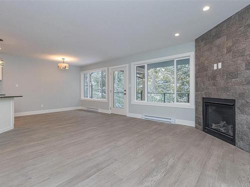 4021 Otters Close, Duncan, BC - Indoor Photo Showing Living Room With Fireplace