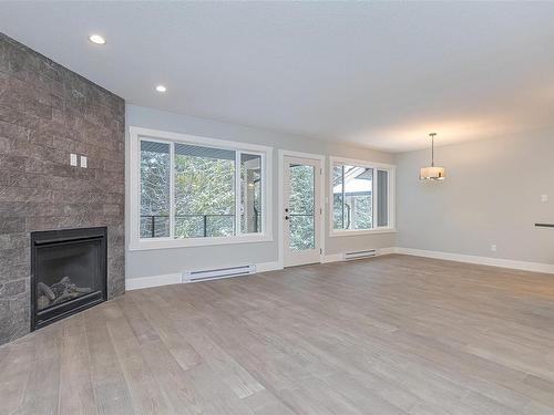 4019 Otters Close, Duncan, BC - Indoor Photo Showing Other Room With Fireplace