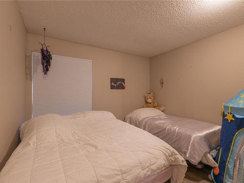 107-585 Dogwood St South, Campbell River, BC - Indoor Photo Showing Bedroom