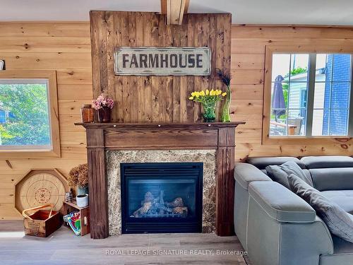 31 Blue Bay Lane, Kawartha Lakes, ON - Indoor Photo Showing Living Room With Fireplace