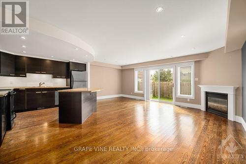 136 Montauk, Ottawa, ON - Indoor Photo Showing Kitchen With Fireplace