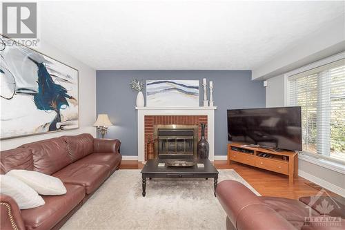 32 Ellisson Way, Ottawa, ON - Indoor Photo Showing Living Room With Fireplace