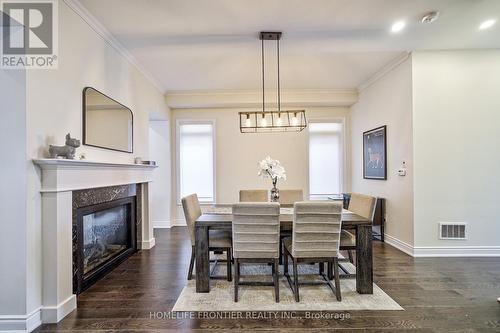 6 Clara May Avenue, East Gwillimbury, ON - Indoor Photo Showing Dining Room With Fireplace