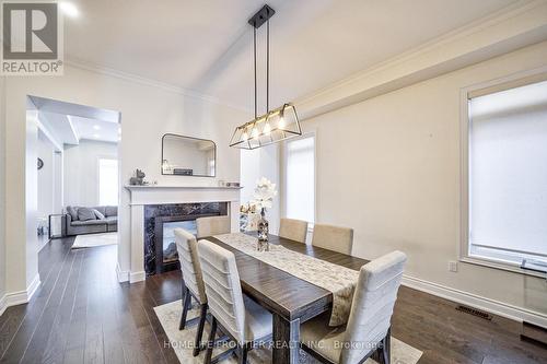 6 Clara May Avenue, East Gwillimbury, ON - Indoor Photo Showing Dining Room With Fireplace