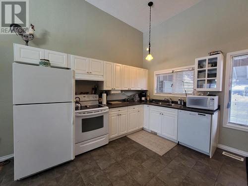 15 486 Quatsino Boulevard, Kitimat, BC - Indoor Photo Showing Kitchen With Double Sink