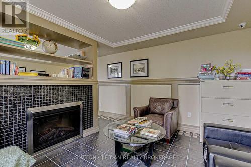 108 - 1030 Coronation Drive, London, ON - Indoor Photo Showing Living Room With Fireplace