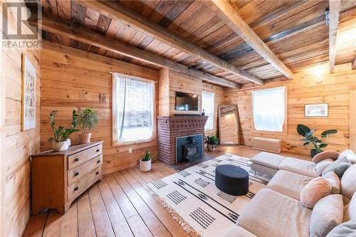 815 Pembroke Street, Pembroke, ON - Indoor Photo Showing Other Room With Fireplace