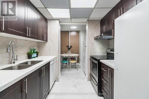 1708 - 65 Huntingdale Boulevard, Toronto (L'Amoreaux), ON - Indoor Photo Showing Kitchen With Double Sink