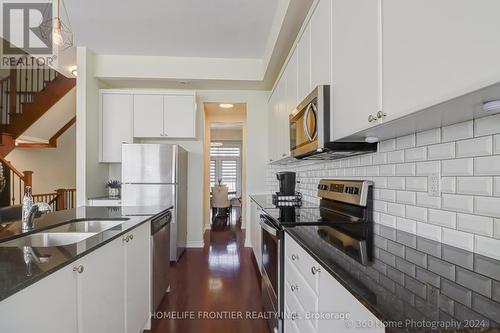 142 Golden Trail, Vaughan (Patterson), ON - Indoor Photo Showing Kitchen With Double Sink