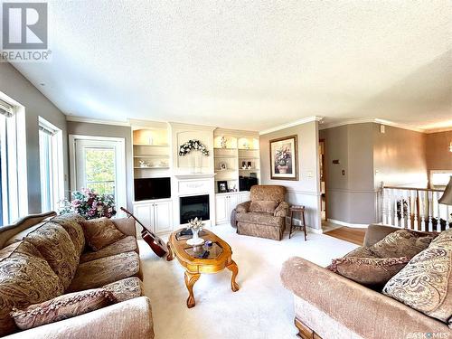 Eberle Acreage, Nipawin Rm No. 487, SK - Indoor Photo Showing Living Room With Fireplace