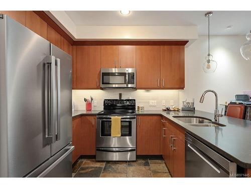 317-1335 Bear Mountain Pkwy, Langford, BC - Indoor Photo Showing Kitchen With Double Sink