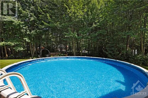 37 Jean Paul Road, Casselman, ON - Outdoor With Above Ground Pool With Backyard