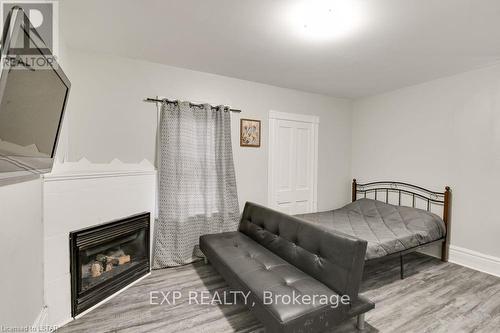 337 Boler Road, London, ON - Indoor Photo Showing Bedroom With Fireplace