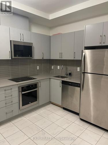 308 - 400 The East Mall, Toronto, ON - Indoor Photo Showing Kitchen With Stainless Steel Kitchen With Upgraded Kitchen