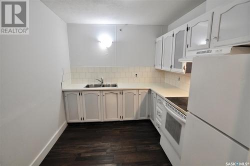 205 537 4Th Avenue N, Saskatoon, SK - Indoor Photo Showing Kitchen With Double Sink