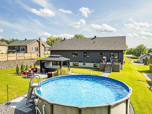 Cour - 207 Rue Des Pins, Roxton Falls, QC - Outdoor With Above Ground Pool With Backyard