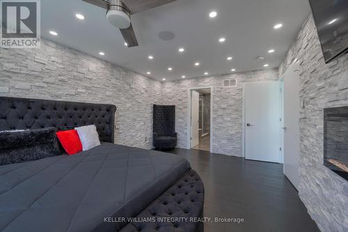 232 Condado Crescent, Ottawa, ON - Indoor Photo Showing Bedroom With Fireplace